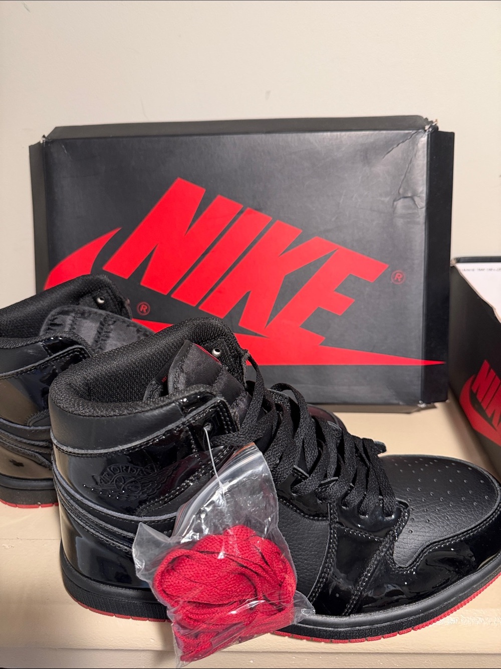 Nike Black Patent Leather High-Top Sneakers with Red Outsole and Laces
